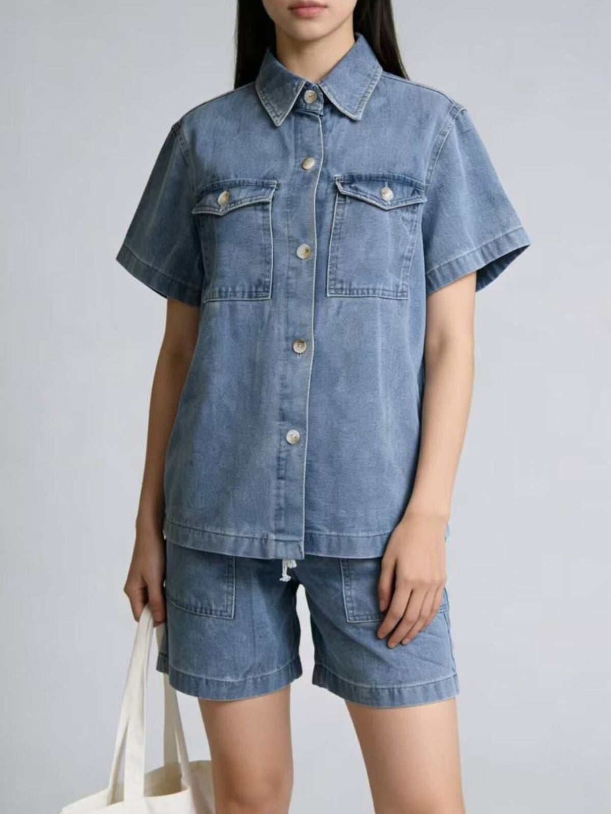 Blue button up top and denim shorts set front view