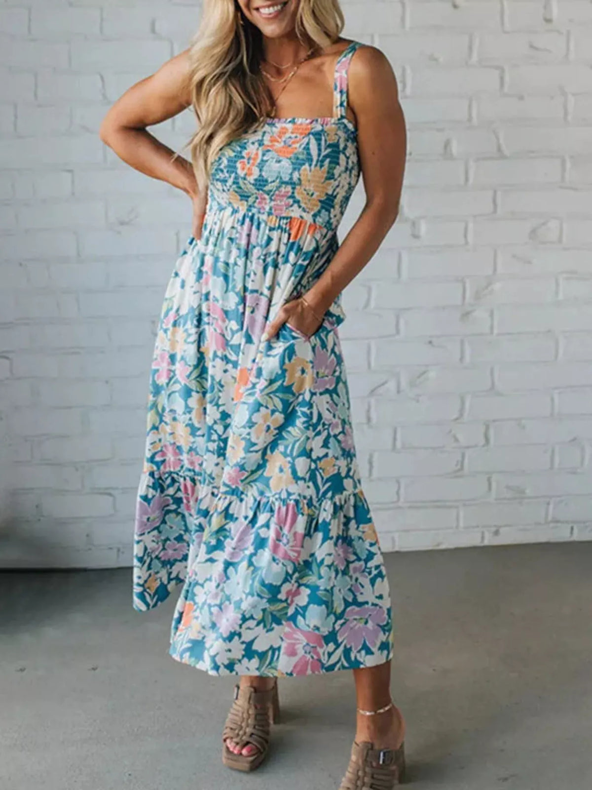 Square neckline and smocking detail on the blue floral dress