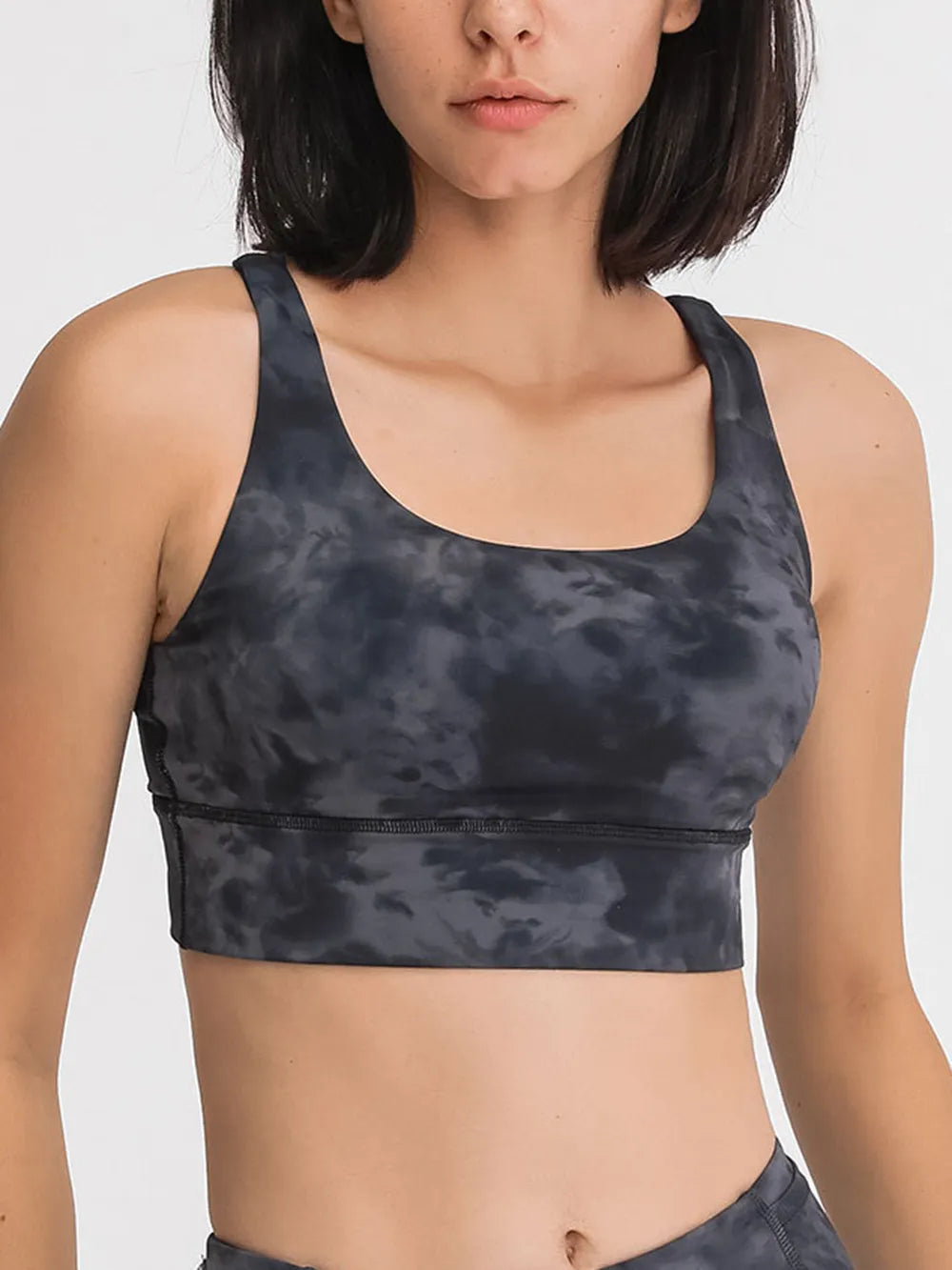 Crisscross scoop neck active tank waist detail