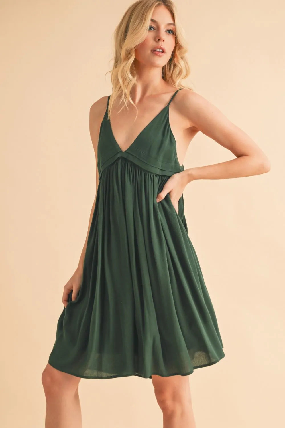 Dark green ruched cami dress side view