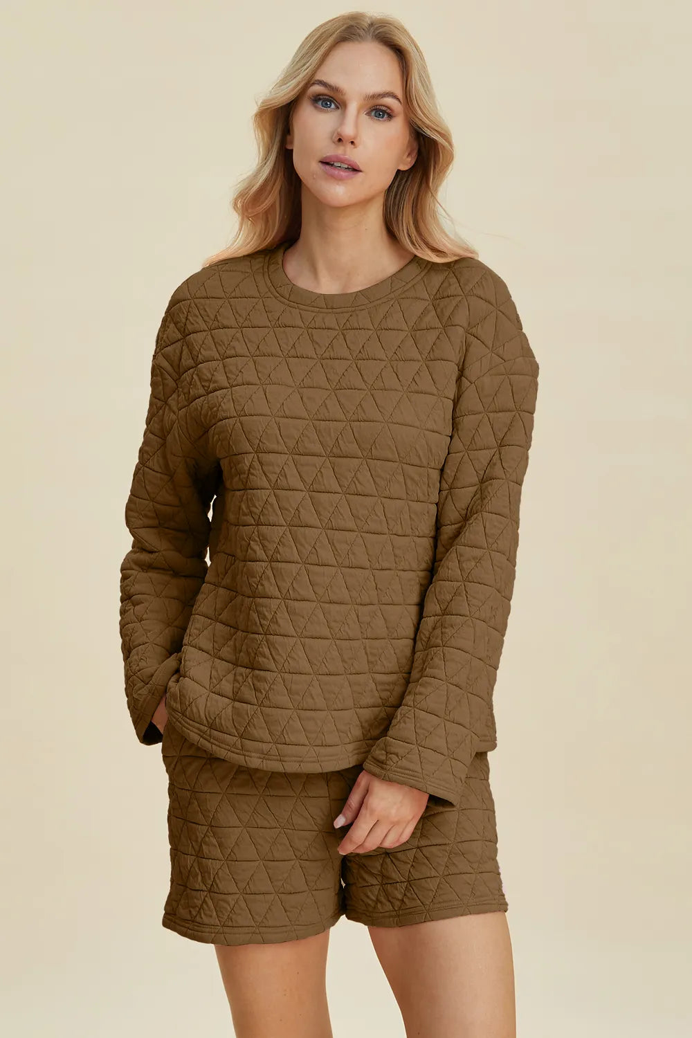 Sleeve and cuff detail on textured set top