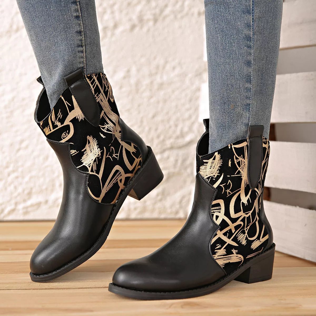 Black point toe block heel boots angled view