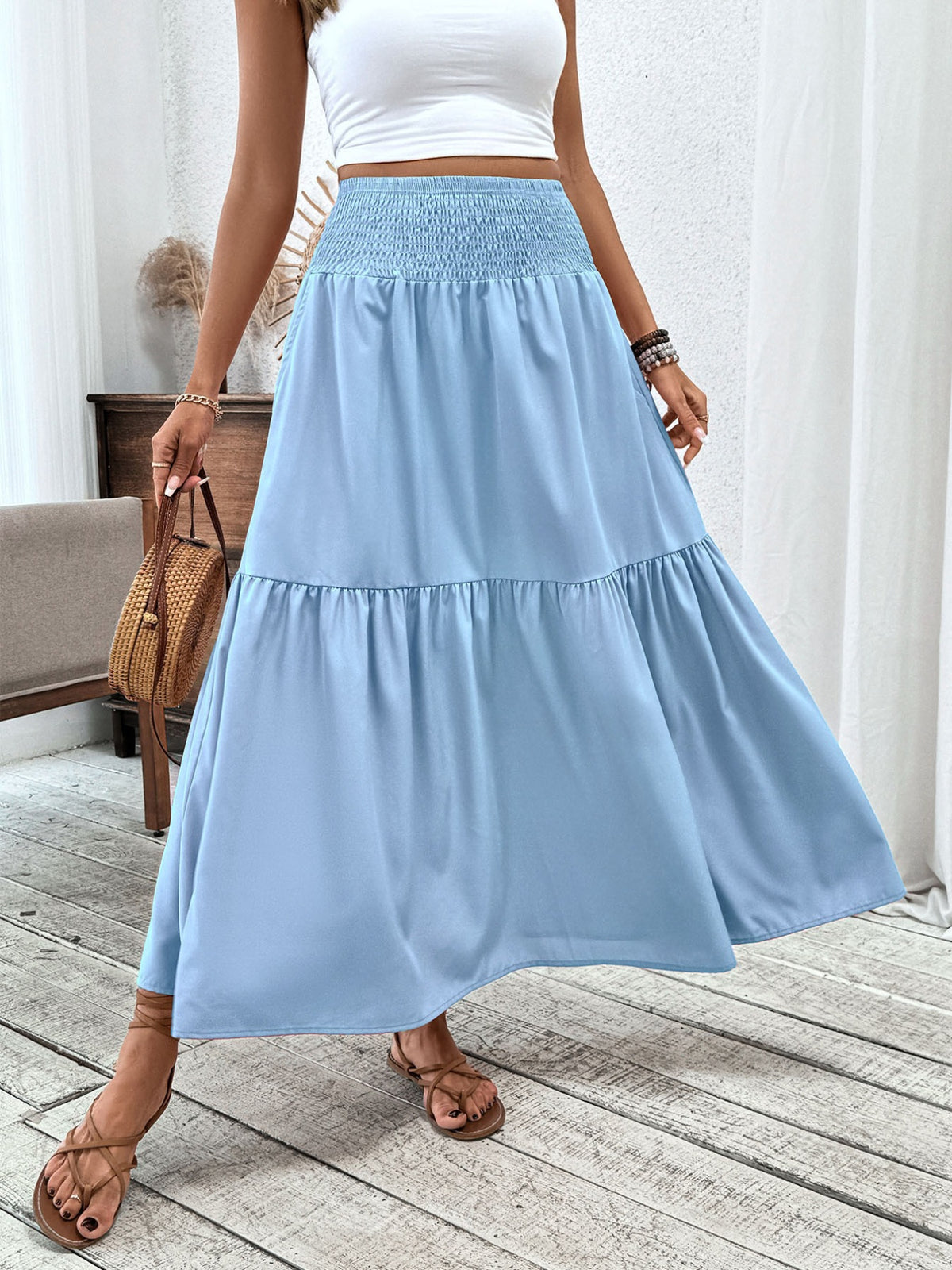 Side view showing the full sweeping hem
