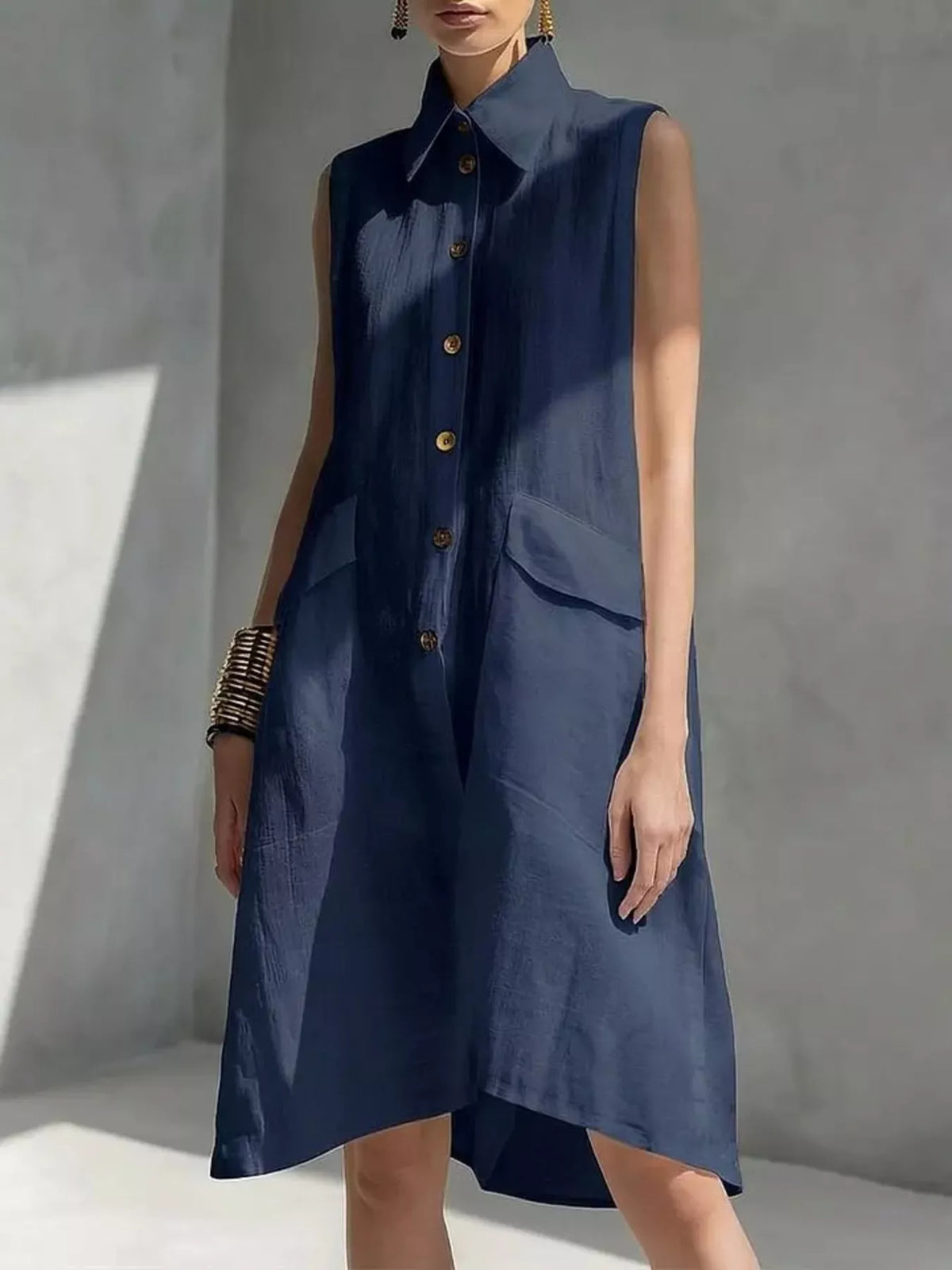 Sleeveless button dress green color