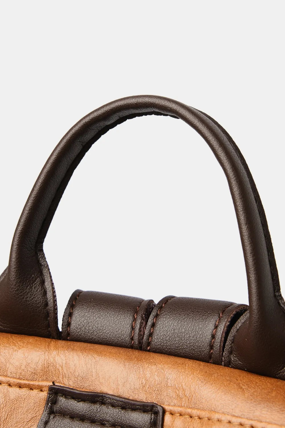 Faux leather backpack worn on the back