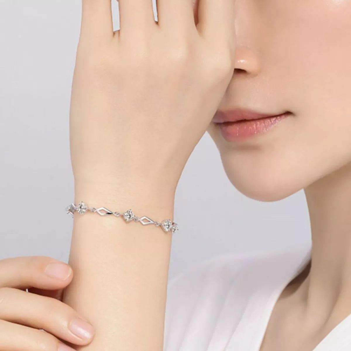 Fine silver bracelet shown against a light surface
