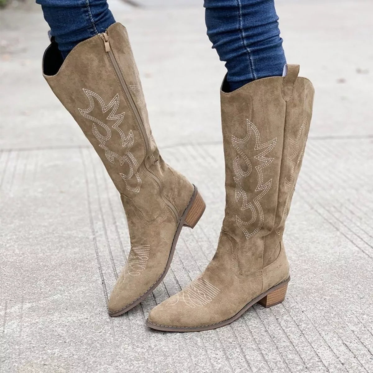 Point toe block heel suede boots angled view