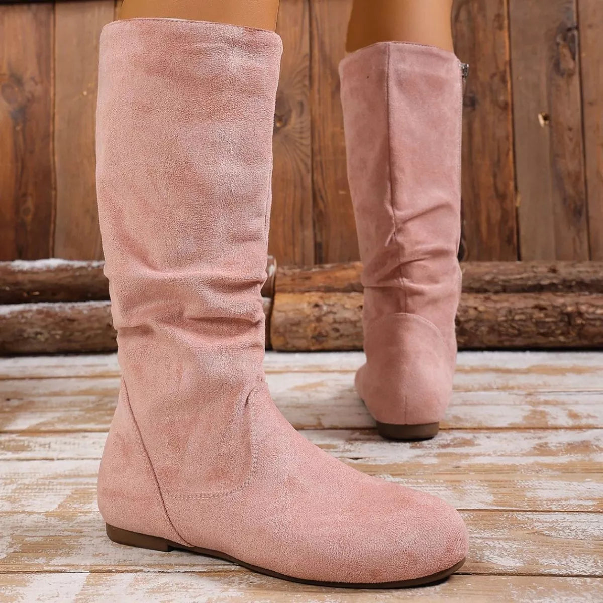 Round toe side zip boots styled on model
