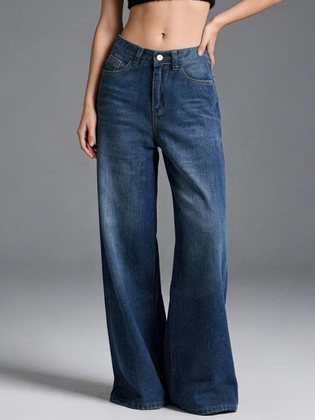 Back view of high waisted wide leg denim