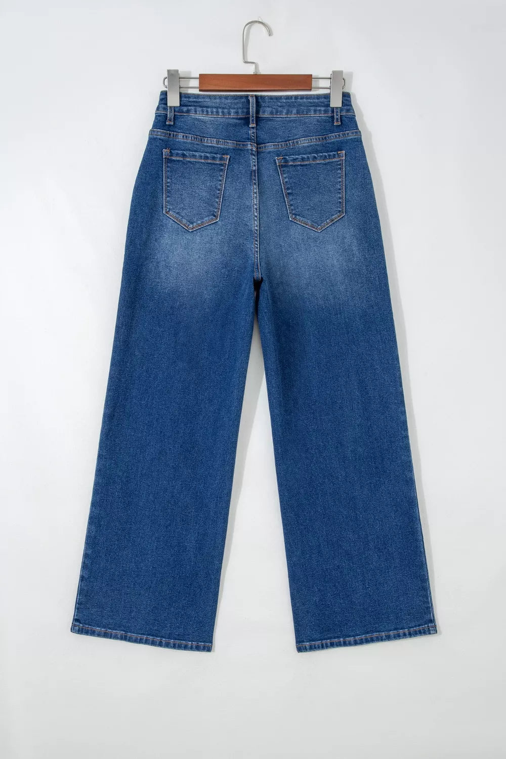 Model wearing seam detail straight leg jeans