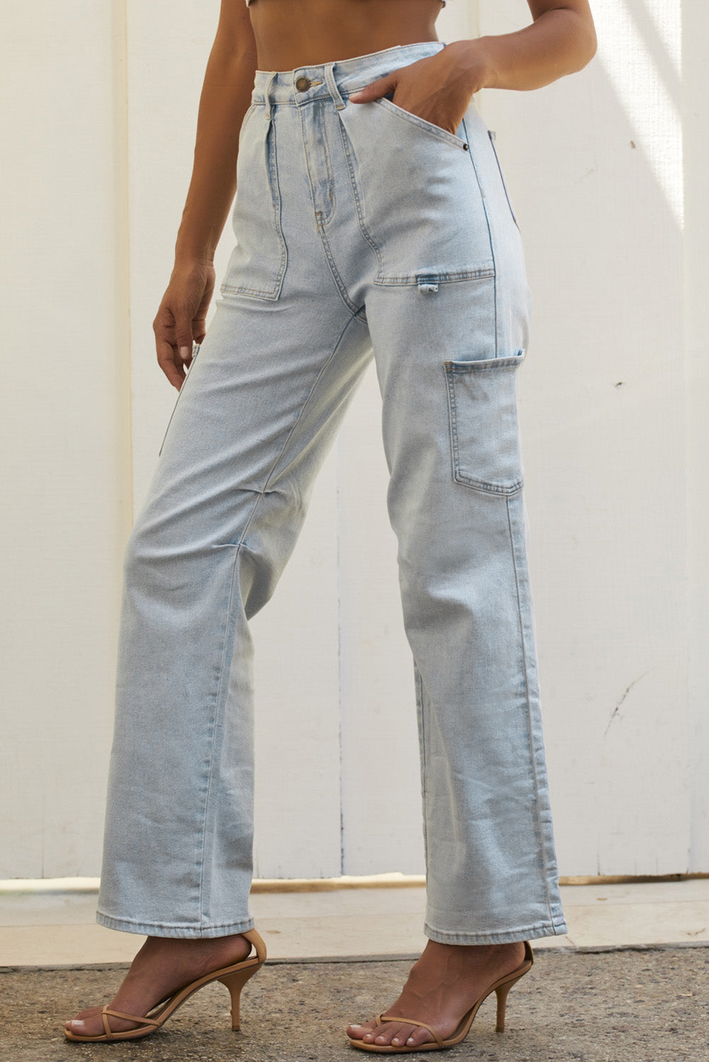 Multi pocket blue jeans back view