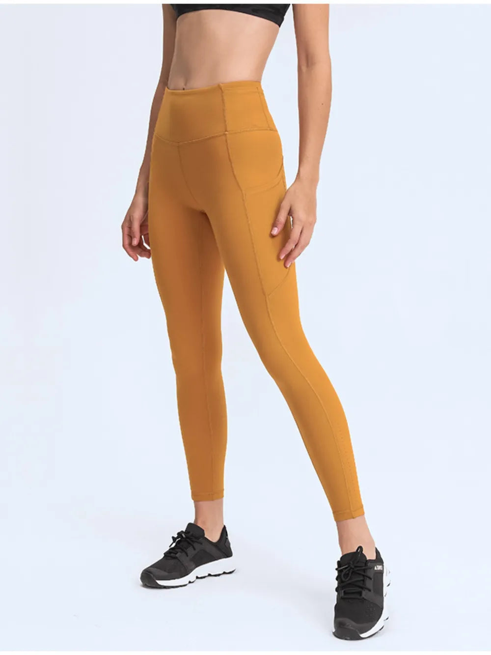 Black pocket leggings on model