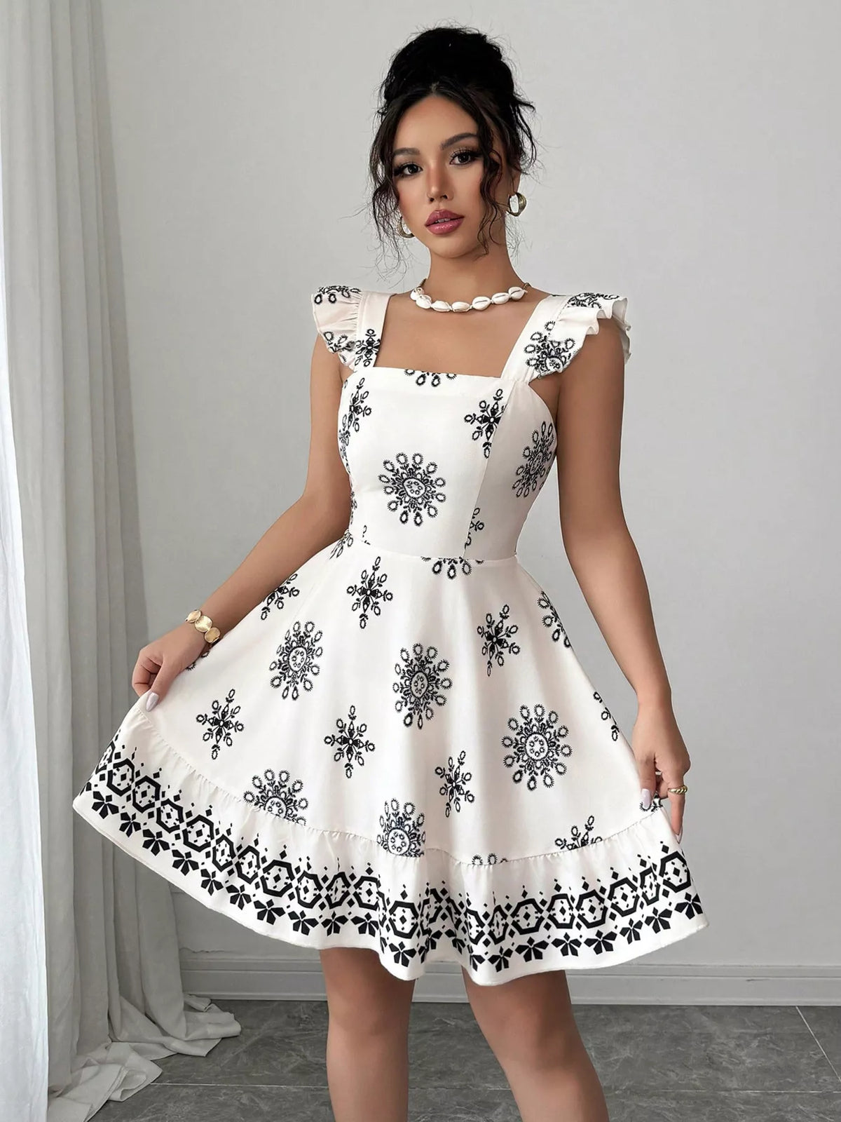 Back view showing the bow on the mini dress