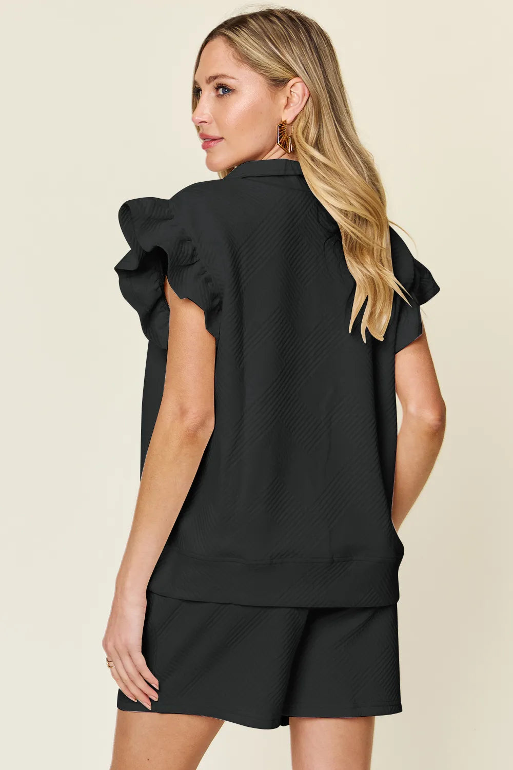 Textured flounce sleeve set styled for summer