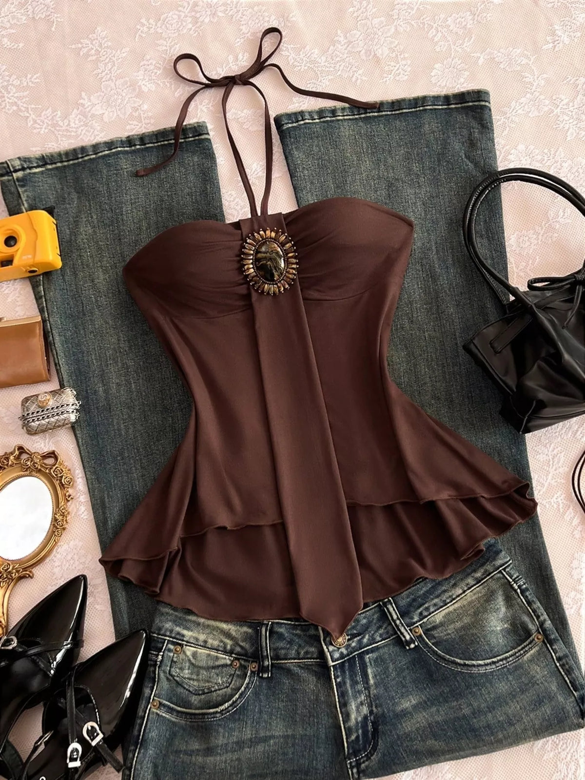 Halter neck cami styled with a high waisted trouser