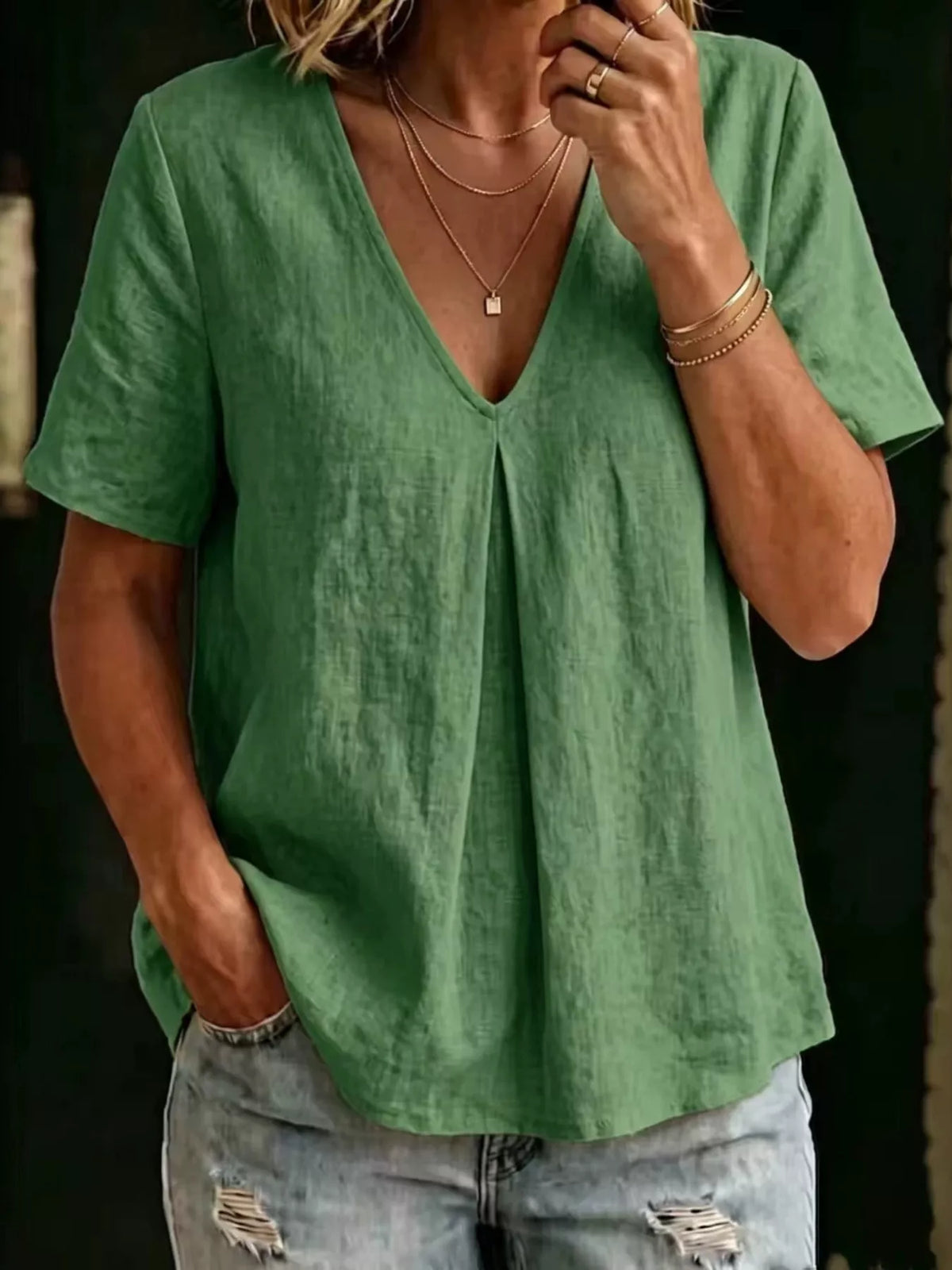 Pleated blouse V neckline detail