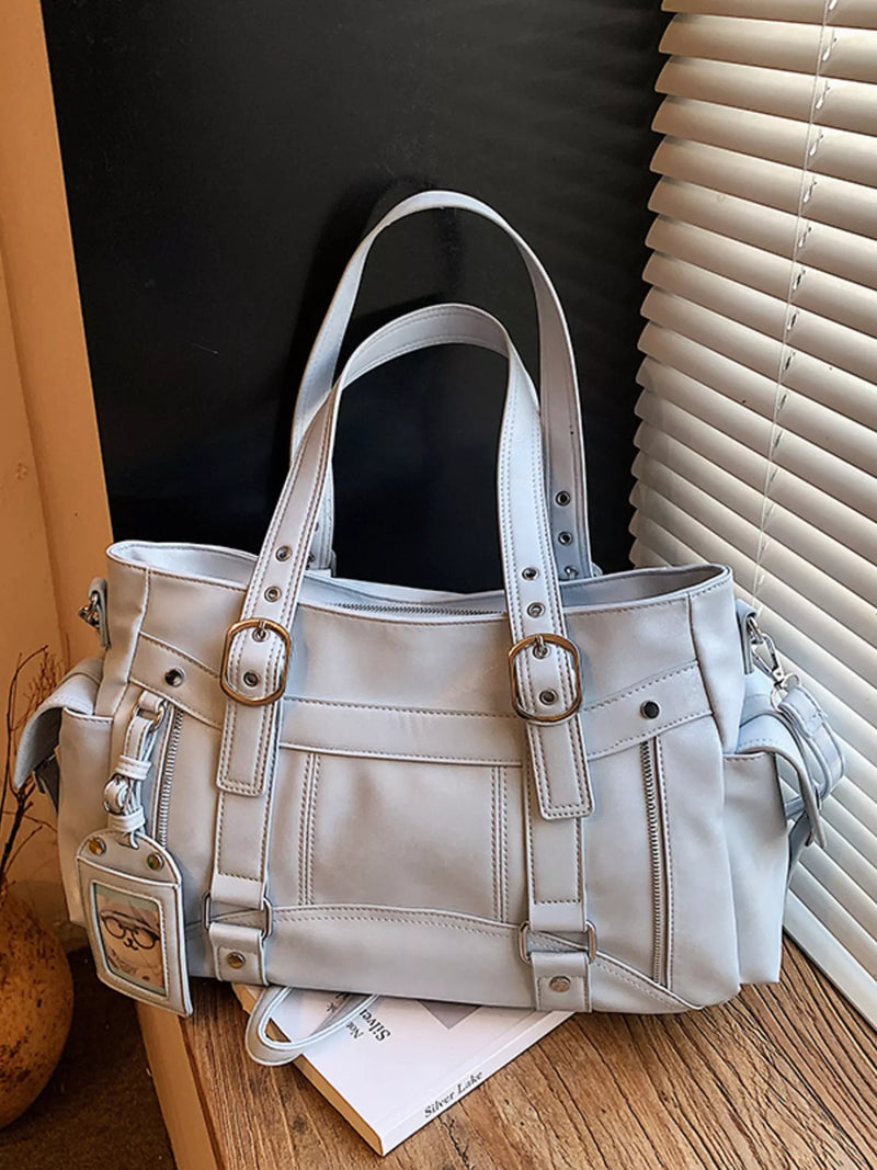 Buckle accent shoulder bag in blue front view