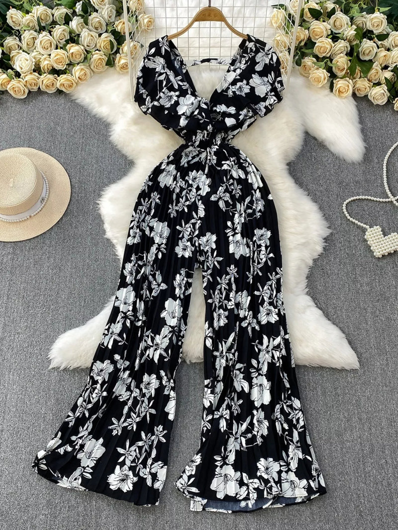 Floral print wide leg pleated jumpsuit front view