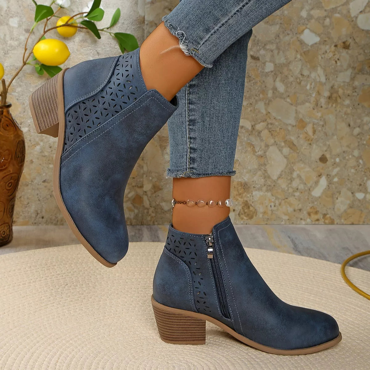Point toe block heel boots back view of the pair