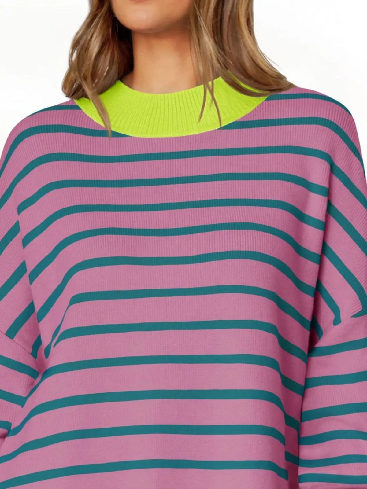 Striped round neck sweater styled with jeans
