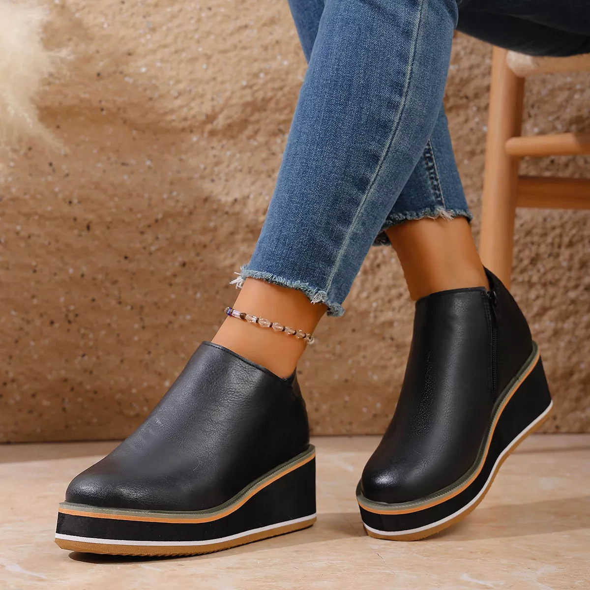 wedge ankle boots with zipper angled pair