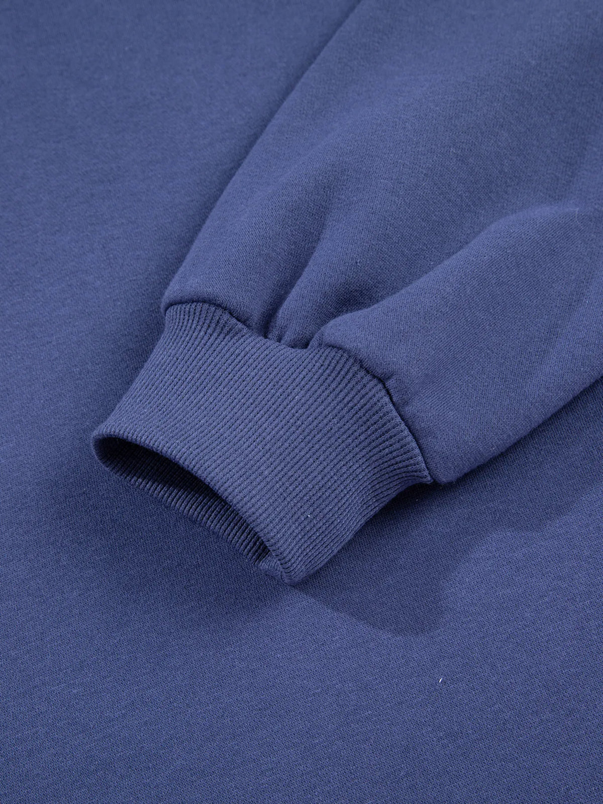 Sleeve detail on navy fleece hoodie