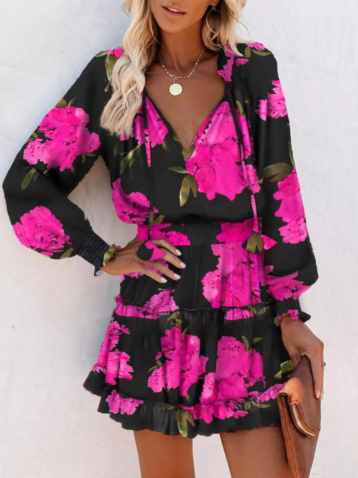 Tie neck lantern sleeve tiered dress back view