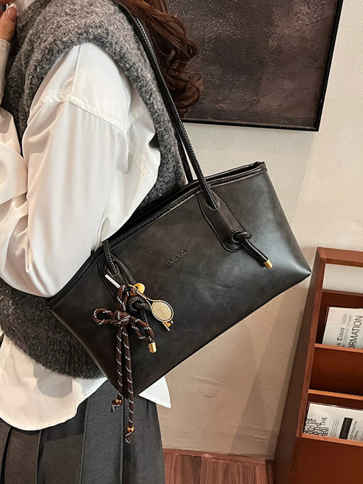 Leather shoulder bag worn on shoulder