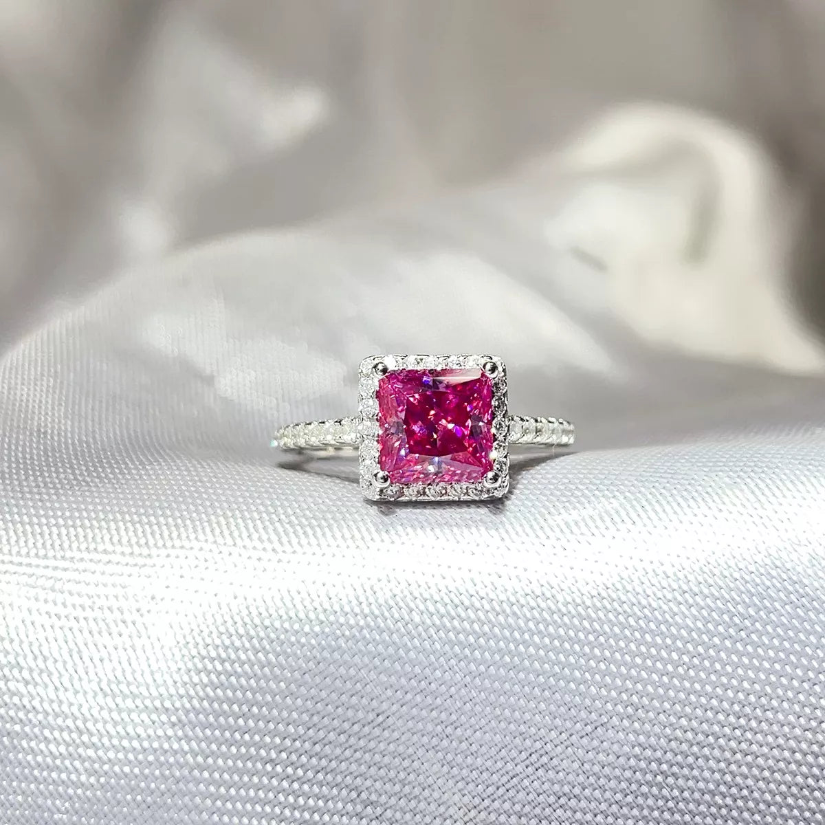 Starglow 2 carat moissanite silver ring with a pink stone