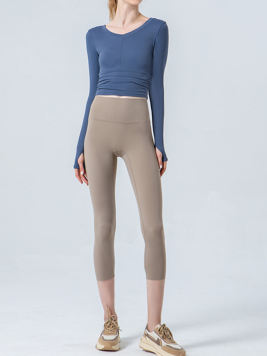 Wide waistband cropped sports leggings seated styled look