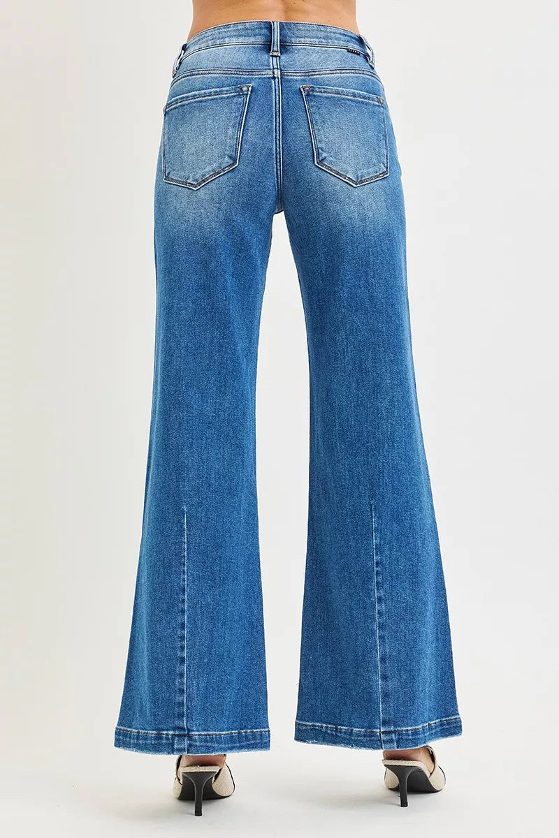 RISEN medium blue flare jeans hem detail