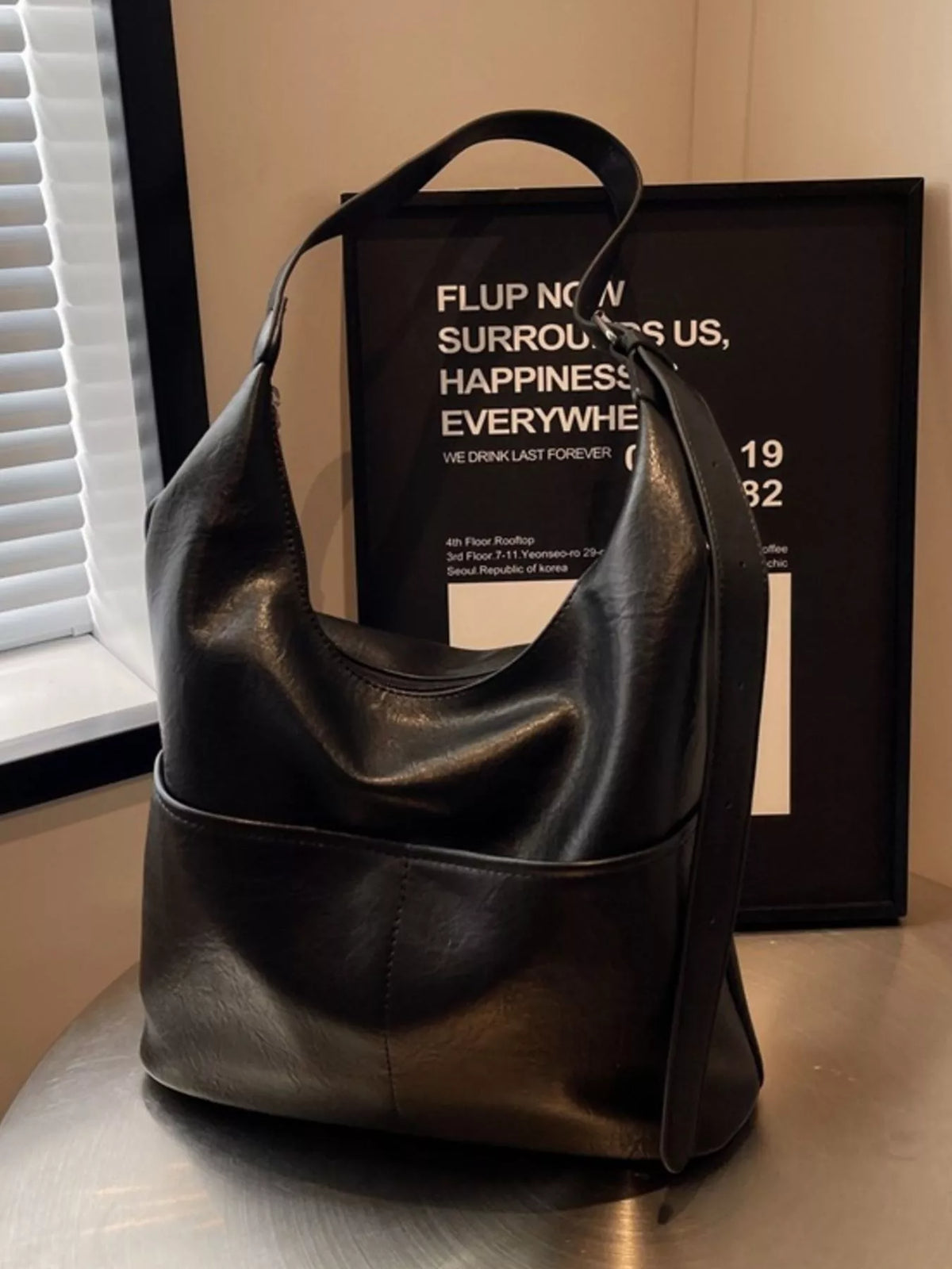 Adjustable strap bag worn crossbody