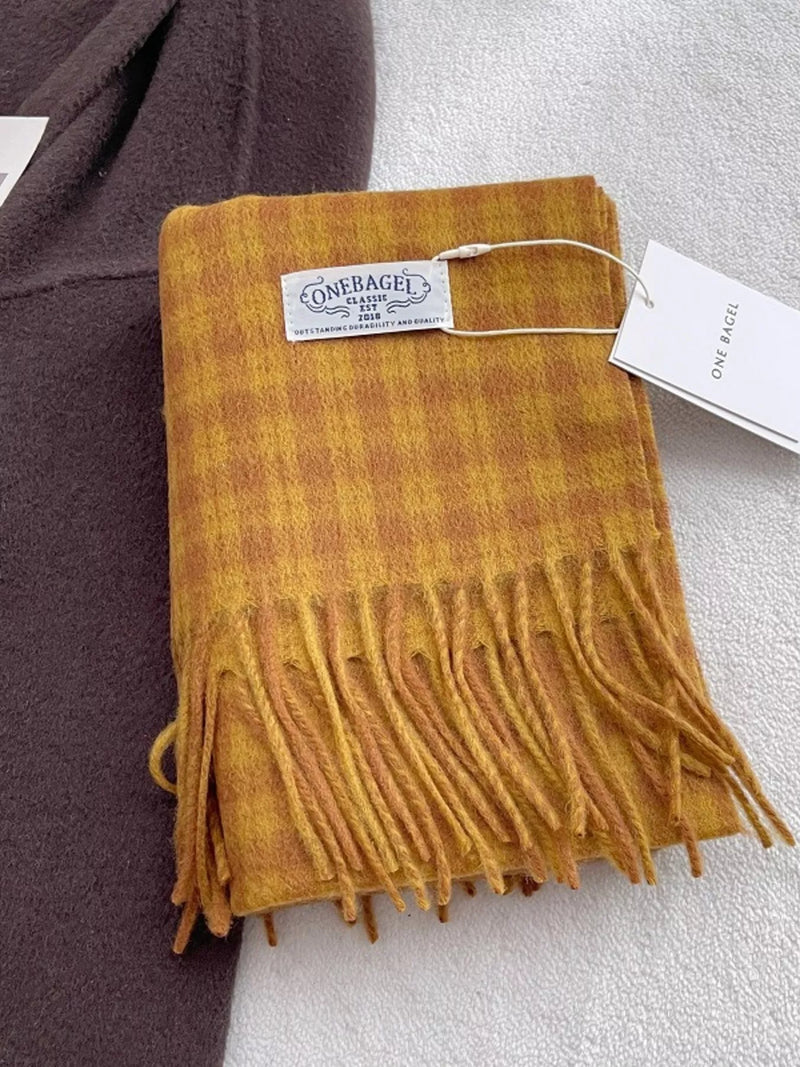 Classic plaid fringe wool scarf wrapped around the neck