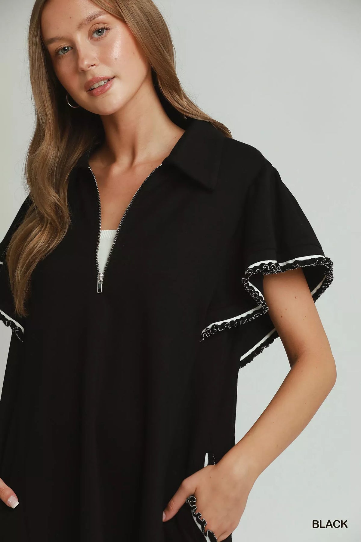 Black half zip butterfly sleeve knit mini dress styled view