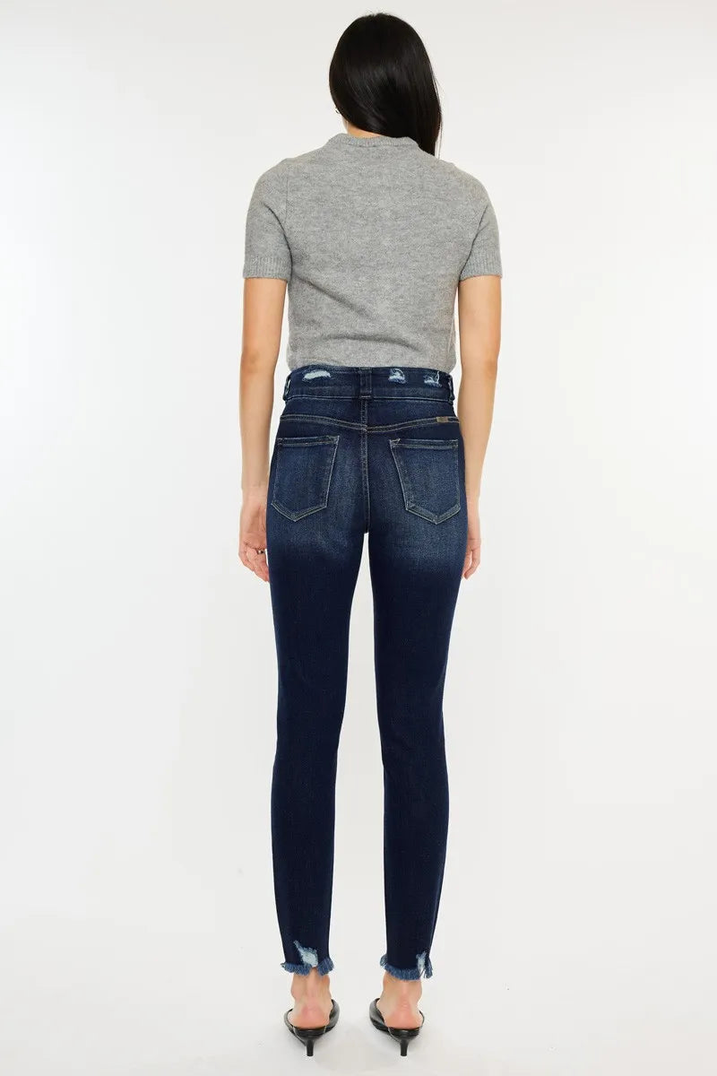 Dark wash raw hem jeans seated view