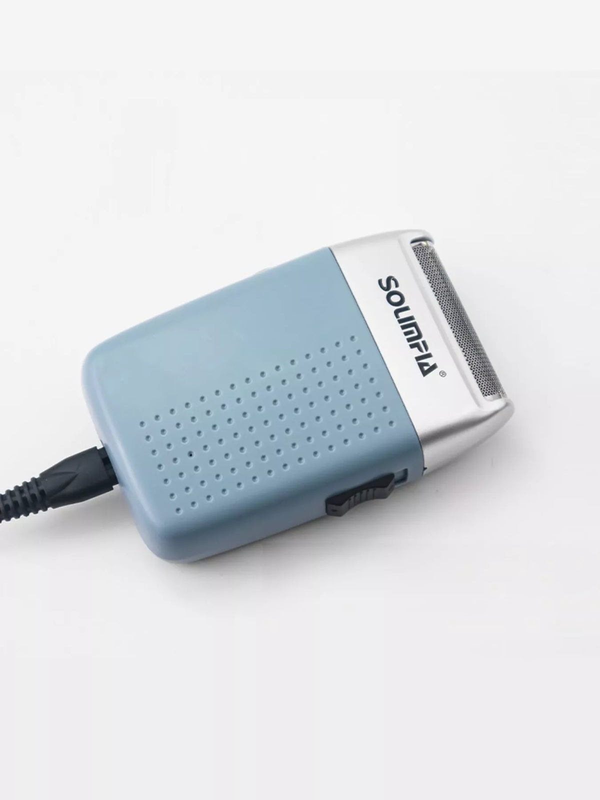 Rotary shaver held in hand