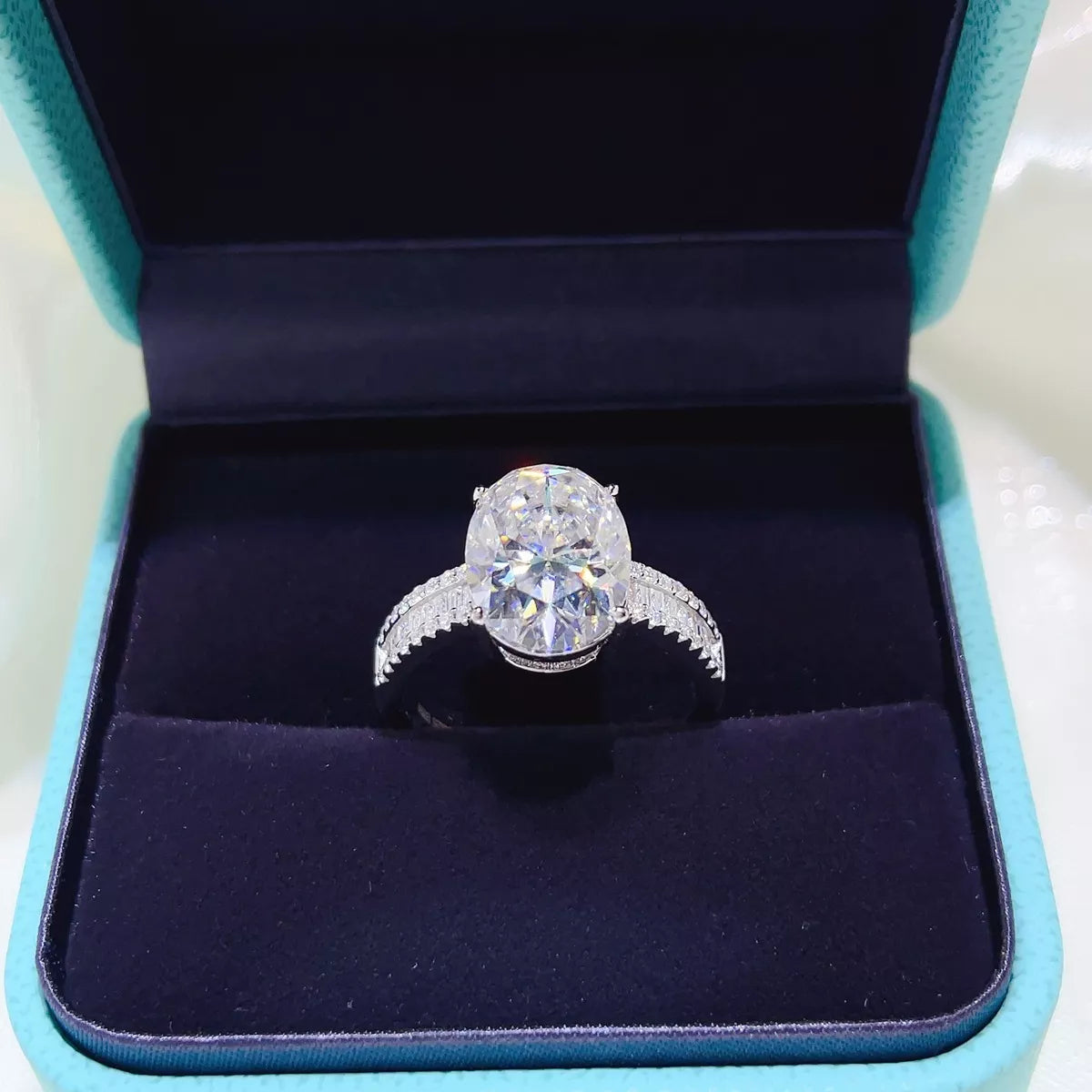 Close up of the 8 carat moissanite stone and silver band