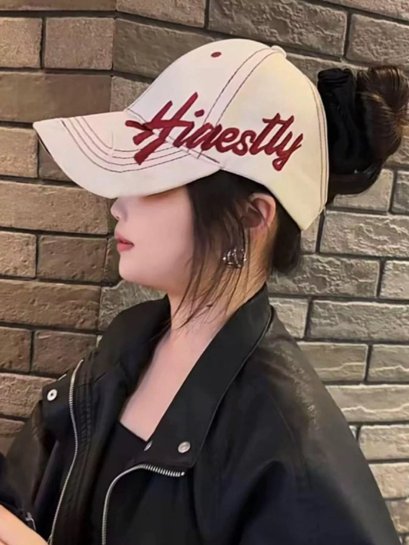 Embroidered cotton baseball cap with curved brim, front view