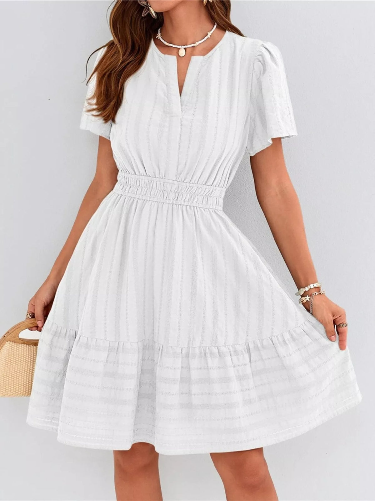 Short sleeve smocked waist tiered midi dress styled view