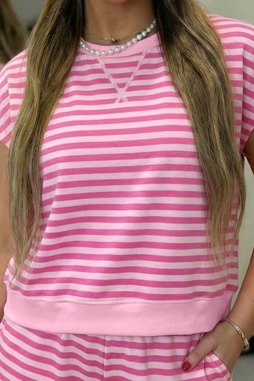 Pink matching round neck striped top and shorts set detail