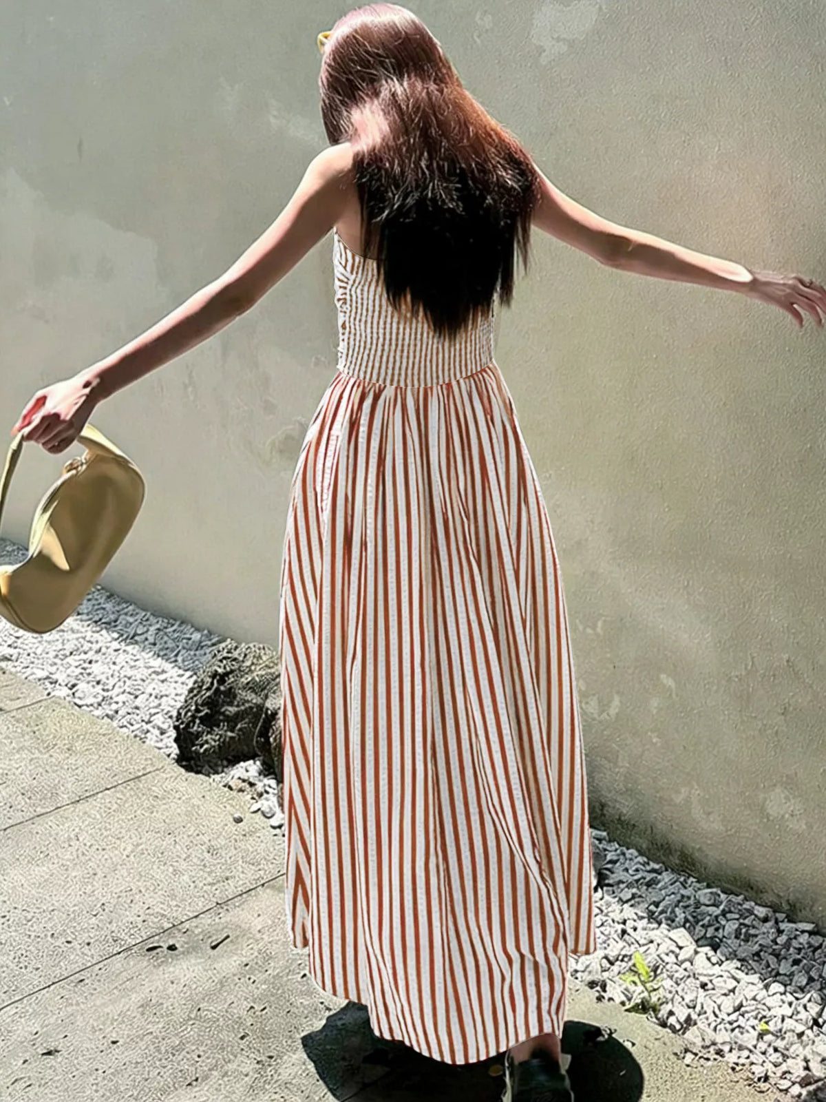 Side pocket detail on striped maxi dress