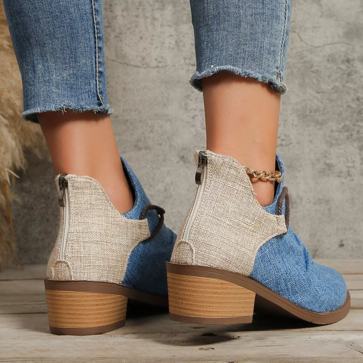 denim block heel ankle boots angled pair