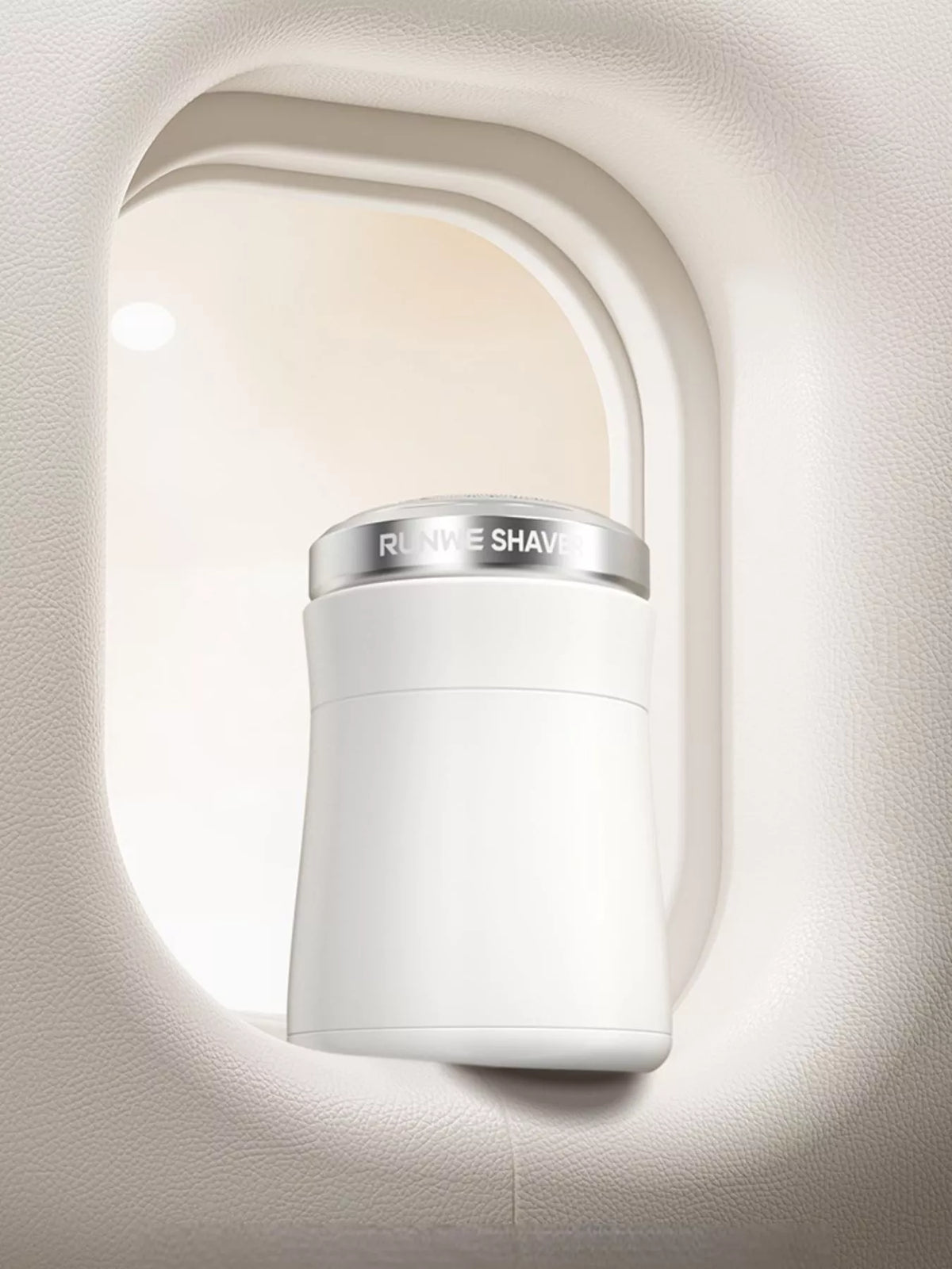 White portable electric shaver front view