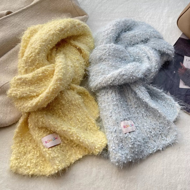 Soft plush winter warm scarf shown wrapped around the neck