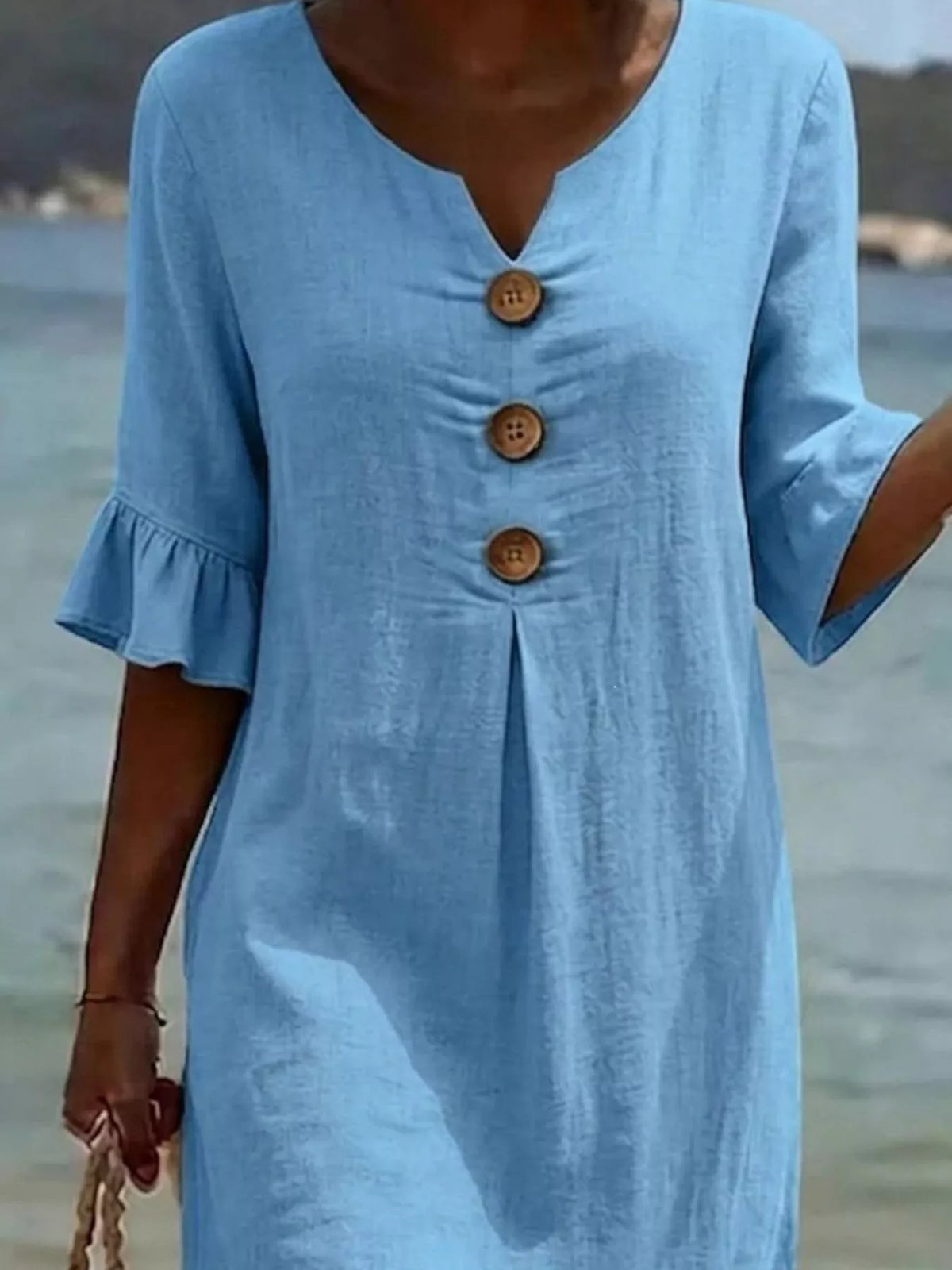 Ruffle sleeve detail on the dress