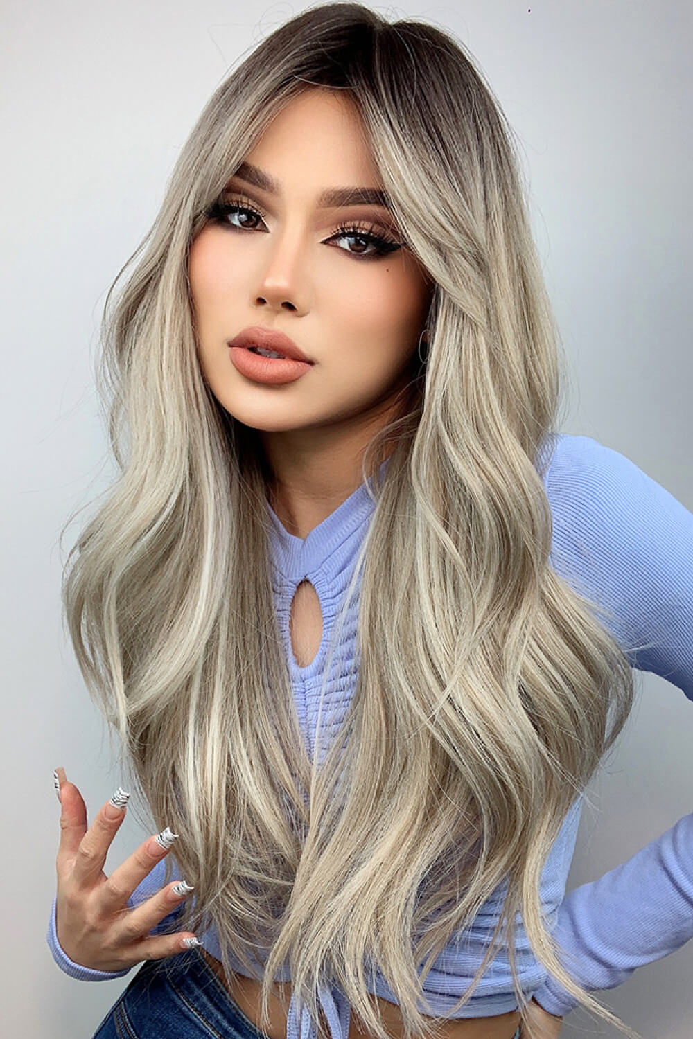 Angled view of the wavy wig on a stand