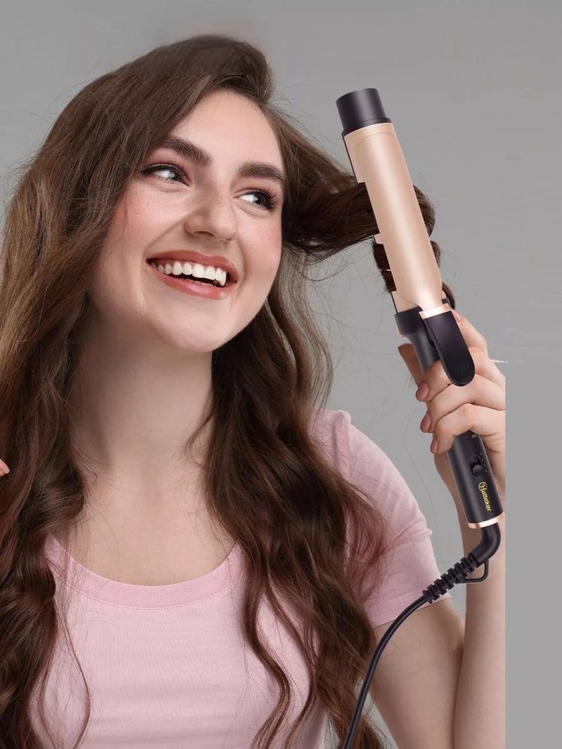 Gold adjustable temperature curling iron front view