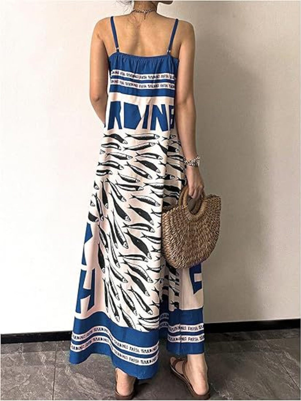 Sardine print spaghetti strap maxi dress detail of the hem