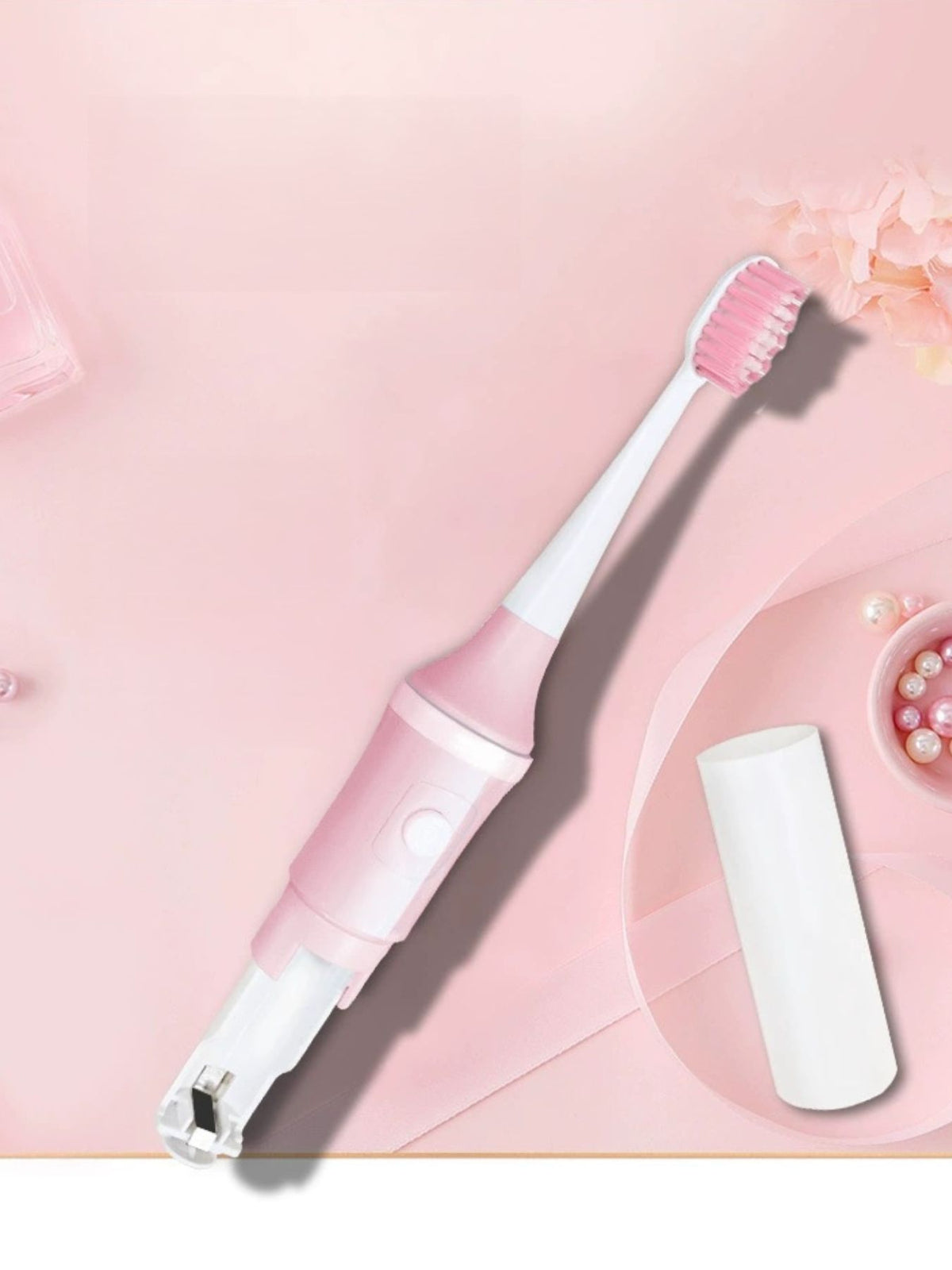 Blush pink electric toothbrush