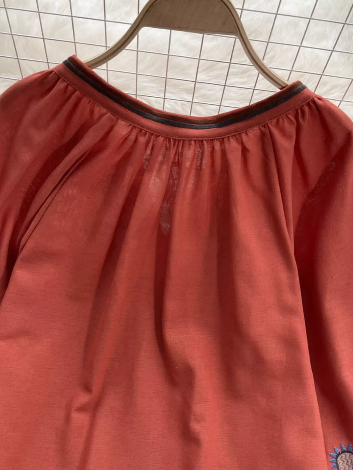 Womens embroidered blouse styled with a relaxed summer look